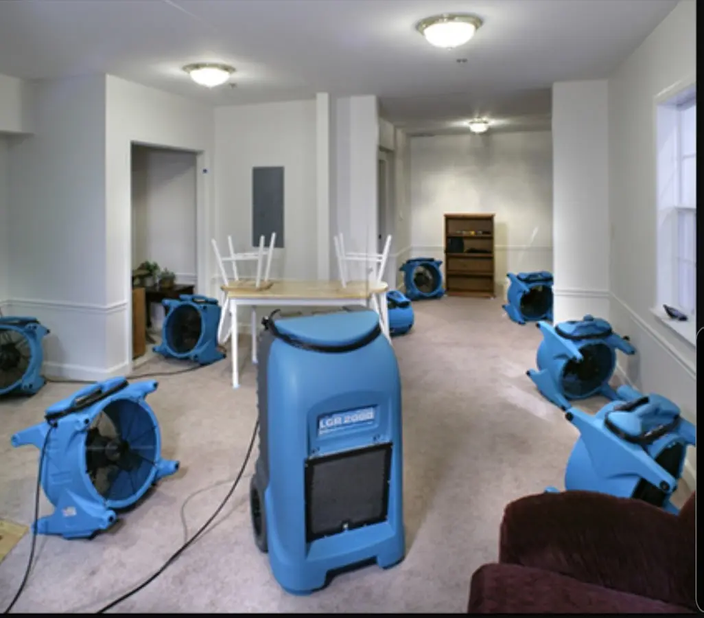 Air movers and dehumidifier setup for Water Damage Restoration in Farmville